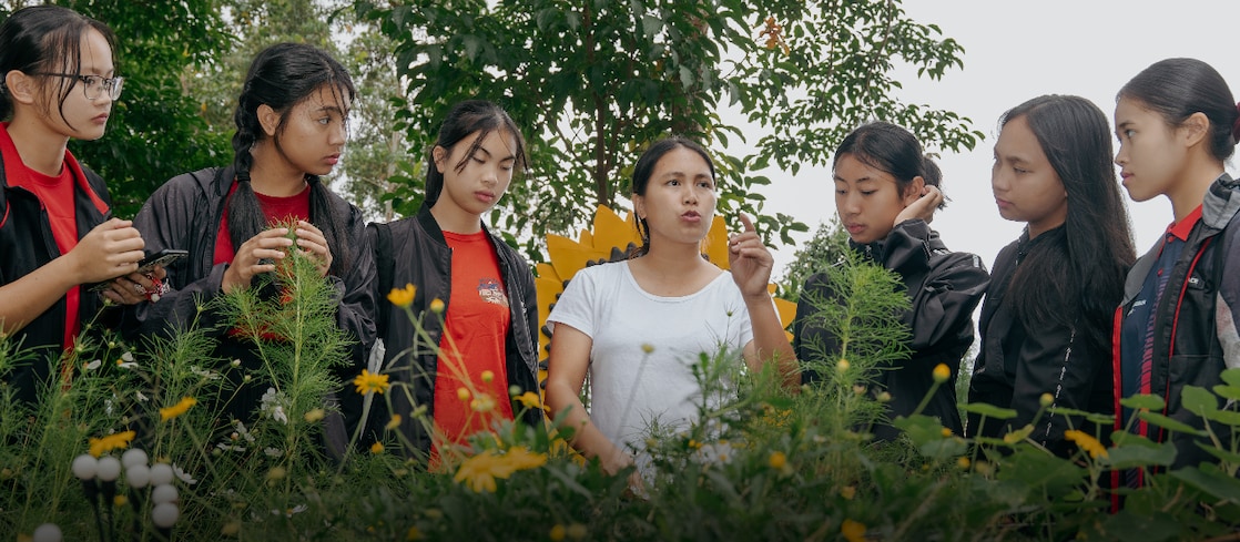 Group of young women outdoors in discussion