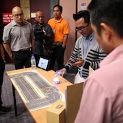 Khairool Adzelan, of Codelab Giving a Demonstration to Shell staff.