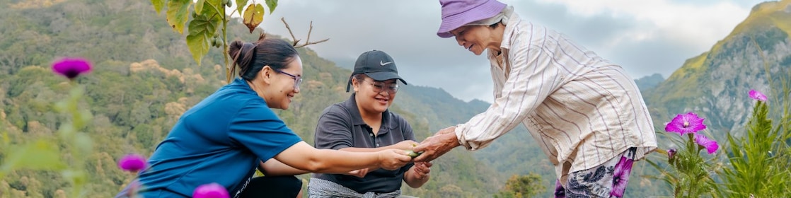 Woman helping old lady