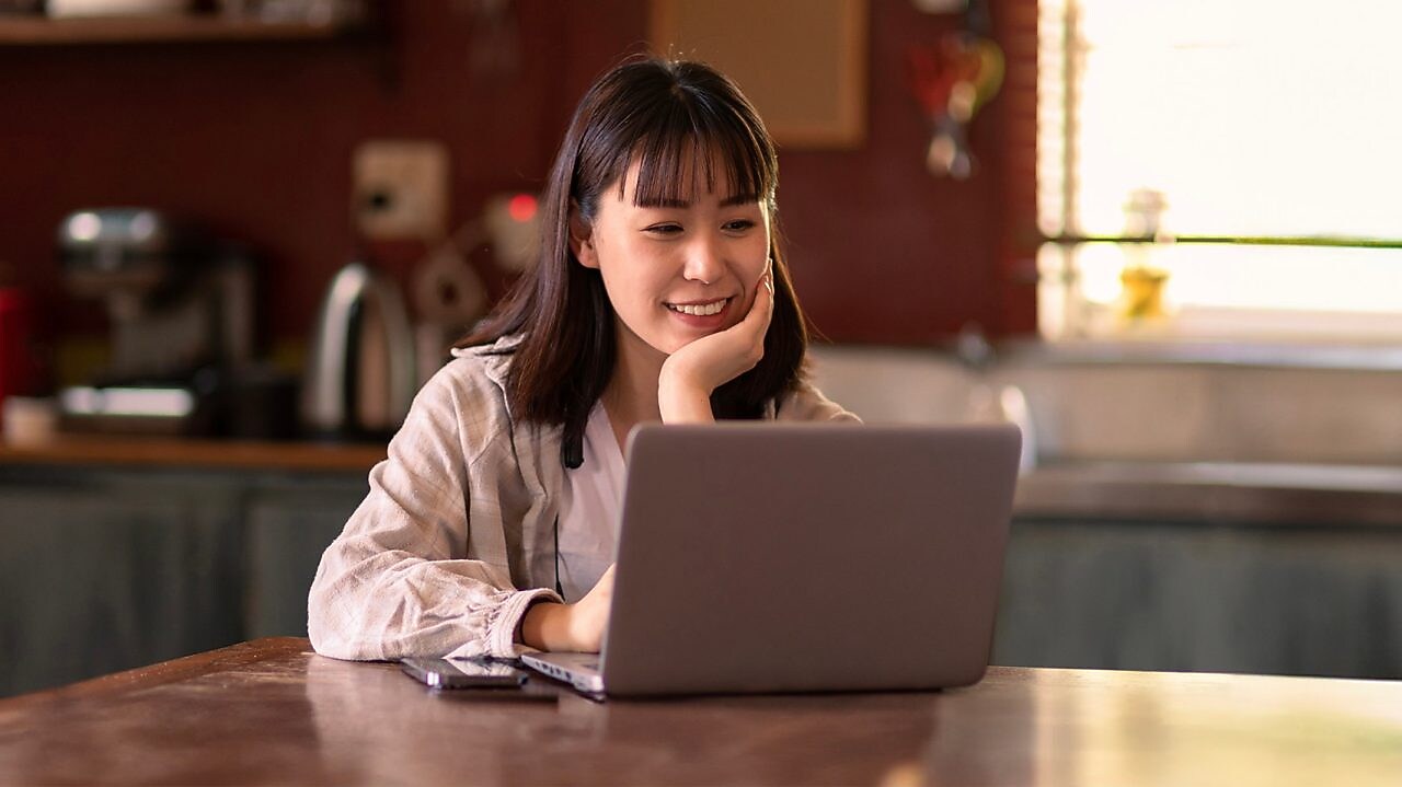 Energy users with her laptop